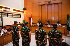 Military court tries soldiers who threw acid on activist
