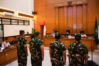Military court tries soldiers who threw acid on activist