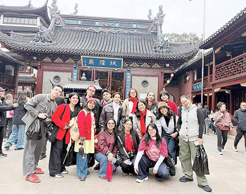 De La Salle-College of Saint Benilde dance students at the City God Temple of Shanghai.