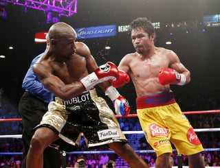 Pacquiao says Mayweather fight is on