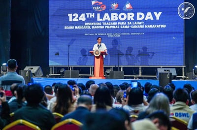 Marcos vows to defend dignity of Filipino workers