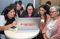 GEMINI Academy participants engage in a hands-on session, exploring how to integrate Google AI tools into their daily operations to enhance productivity and grow their local businesses.