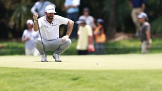 Young soars behind hot putter