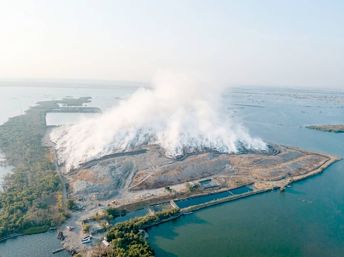 THERMAL drone images from the Manila disaster department reveal a fire still burning beneath the Navotas Sanitary Landfill, its heat spreading unseen as smoke drifts over the city.
