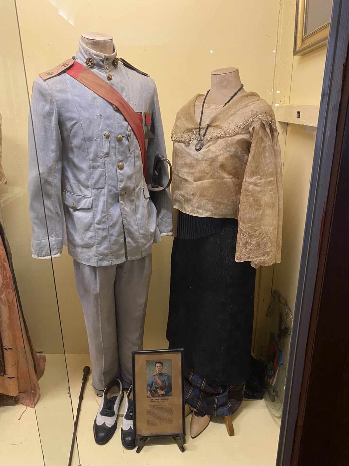 Historic garments worn by Philippine President Emilio Aguinaldo and his wife, offering a rare glimpse into his presidential-era style.