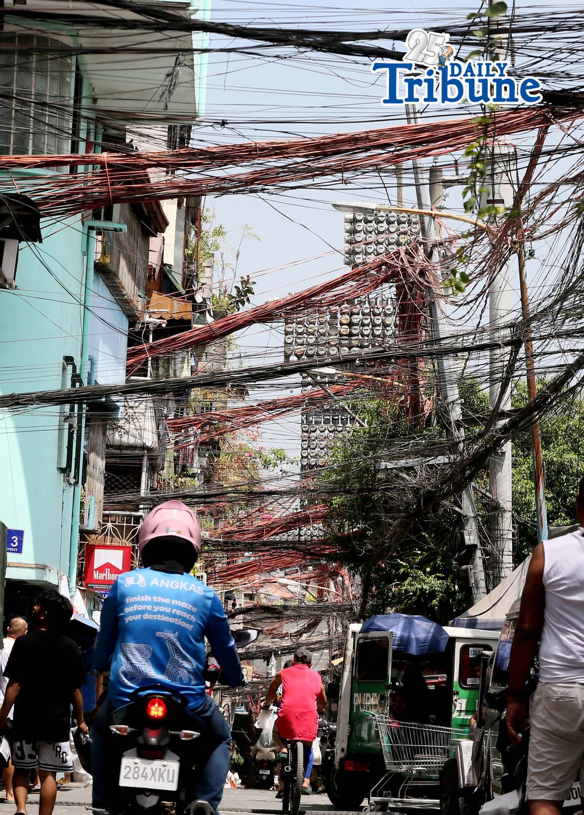 (May 02 2026) Tangled electric wires or “Spaghetti wires” seen at crowded street in Mandaluyong City, on Saturday May 2 2026, as electricity costs surge alongside the sweltering heat, on May 2, 2026. Photo/Analy Labor