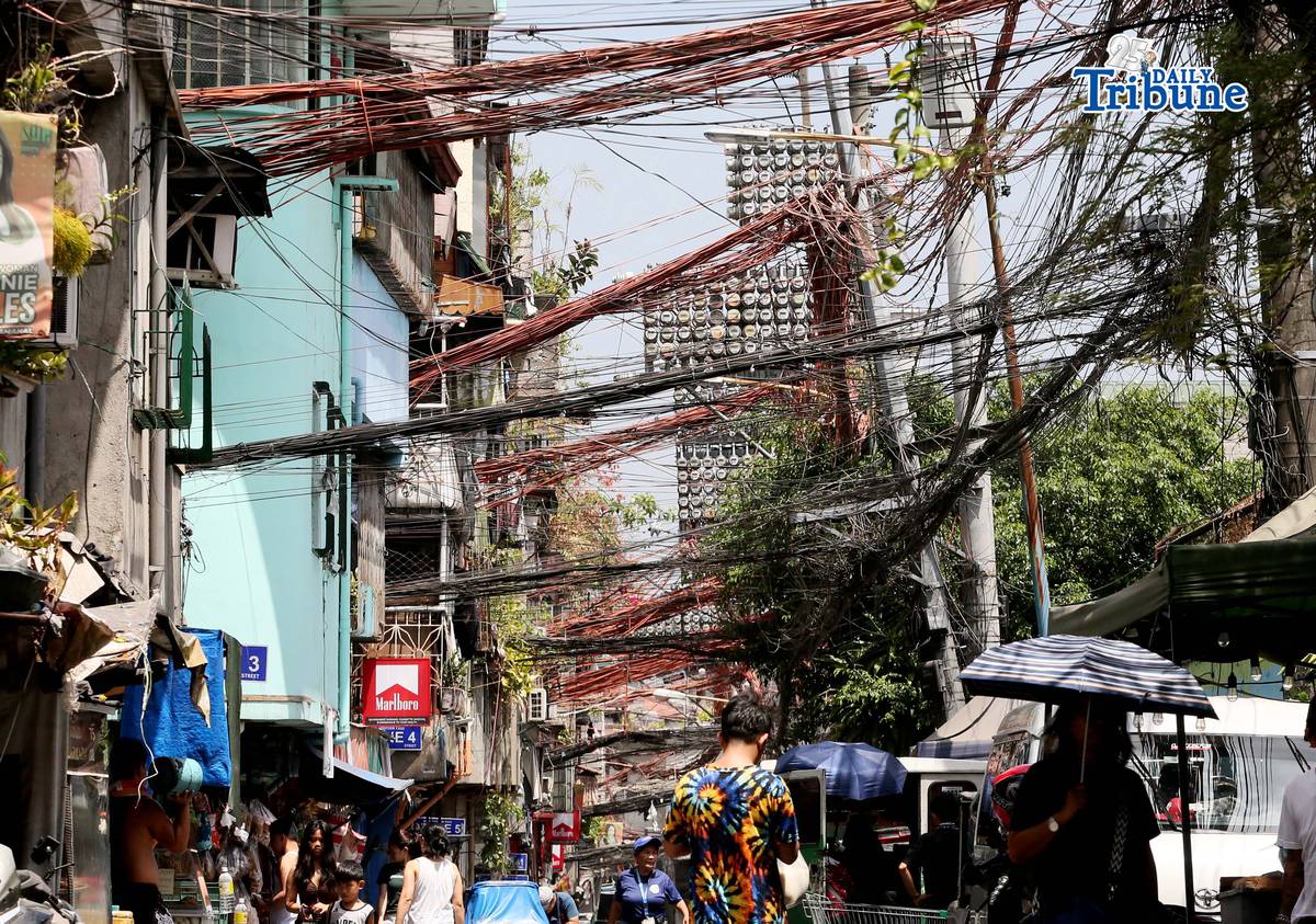 (May 02 2026) Tangled electric wires or “Spaghetti wires” seen at crowded street in Mandaluyong City, on Saturday May 2 2026, as electricity costs surge alongside the sweltering heat, on May 2, 2026. Photo/Analy Labor