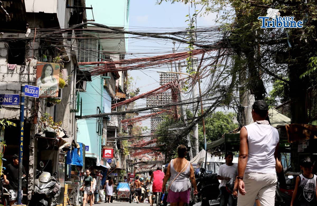 (May 02 2026) Tangled electric wires or “Spaghetti wires” seen at crowded street in Mandaluyong City, on Saturday May 2 2026, as electricity costs surge alongside the sweltering heat, on May 2, 2026. Photo/Analy Labor