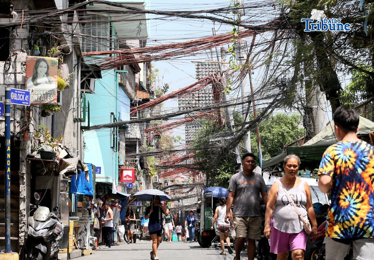(May 02 2026) Tangled electric wires or “Spaghetti wires” seen at crowded street in Mandaluyong City, on Saturday May 2 2026, as electricity costs surge alongside the sweltering heat, on May 2, 2026. Photo/Analy Labor