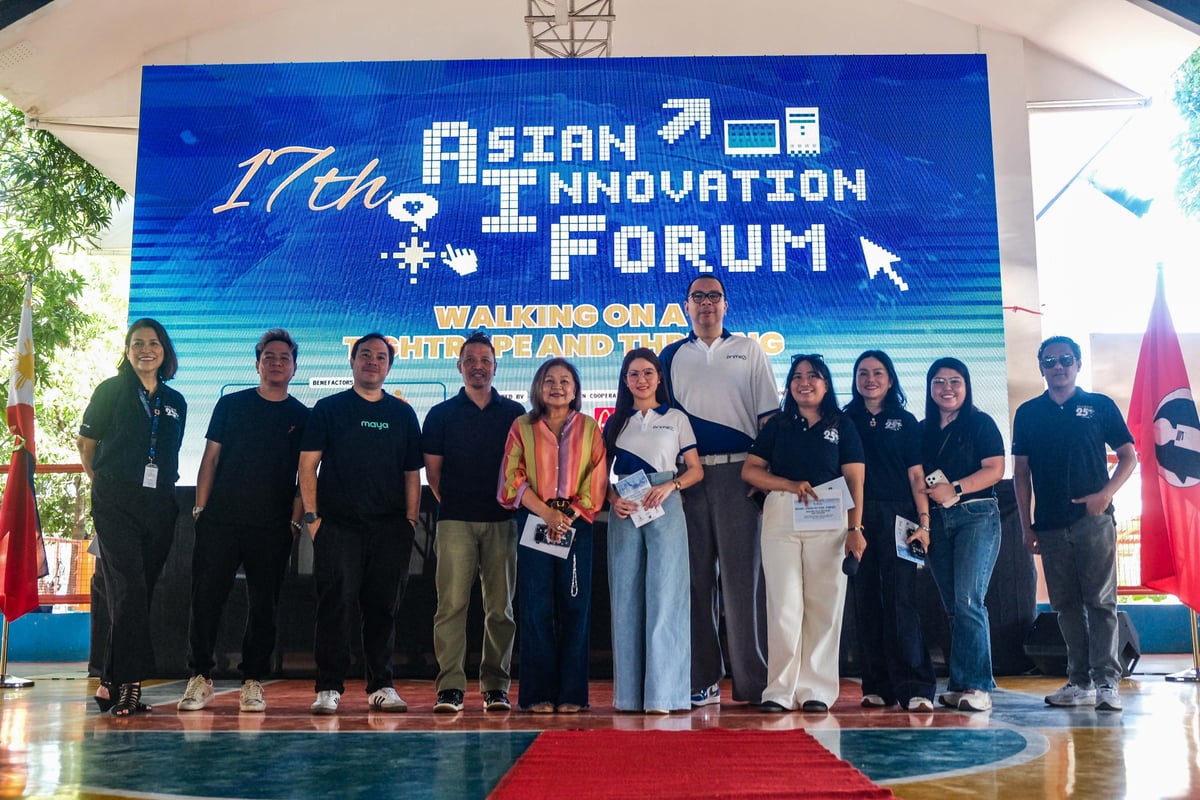 THEMED ‘Walking on a tightrope and thriving,’ the 17th AIF was able to reach out to the communities in and around Poblacion, Muntinlupa. The DT team and guests (from left): Chingkee Mangcucang, Louie Rosales, Joms Ramirez, Wally Calderon, Mrs. Trina Biazon, Mhai Bantados, Zach Lopez, Patricia Ramirez, Dinah Ventura, Jelene Galvan and Elmer Manuel.