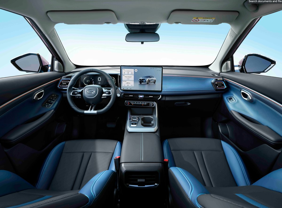CABIN of the 2026 GAC Emzoom includes a 14.6-inch touchscreen, Android Auto projection and blue-and-black interior trim.