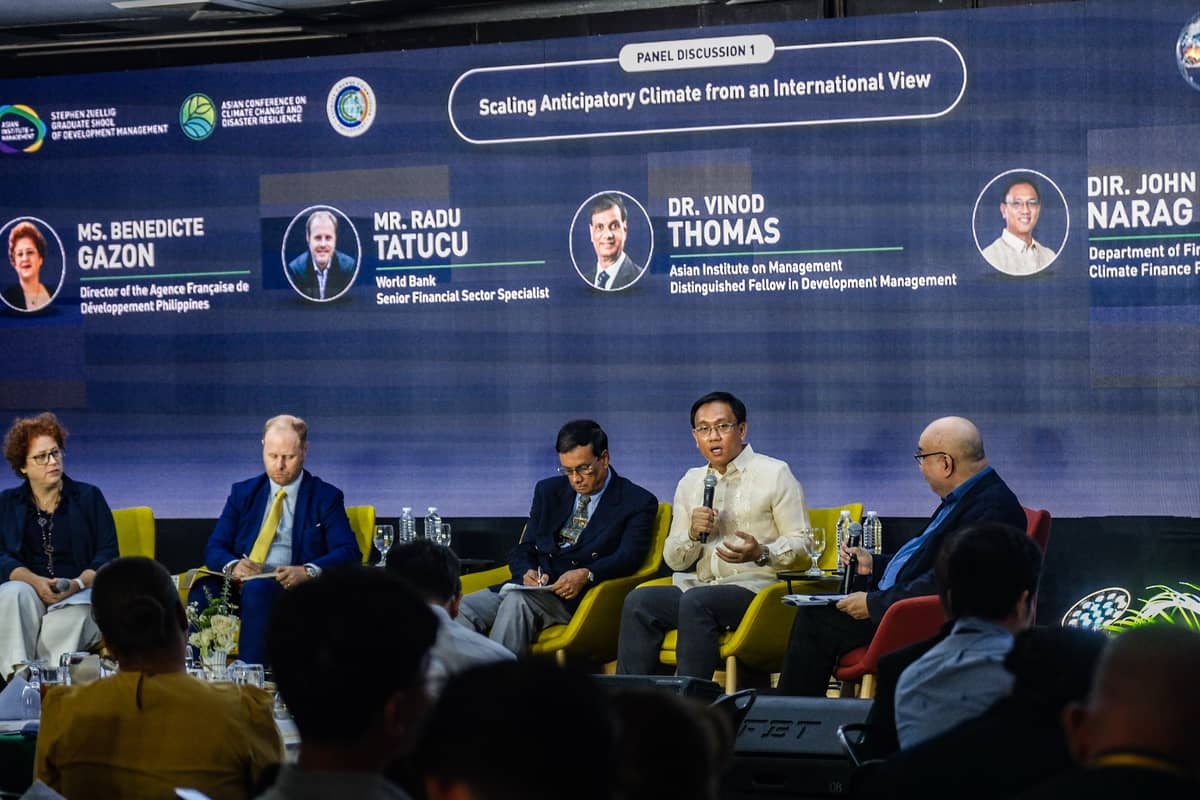 A PANEL discussion sees (from left) Benedicte Gazon, director of the Agence Française de Développement Philippines; Radu Tatucu, senior financial sector specialist at the World Bank; Vinod Thomas, distinguished fellow in development management at the Asian Institute of Management; John Narag, director of the Department of Finance’s Climate Finance Group; and Jose Luis Santillan, faculty member at AIM, discussing available disaster readiness funding at the Asian Conference on Climate Change and Disaster Resilience at AIM in Makati City on 30 April 2026.