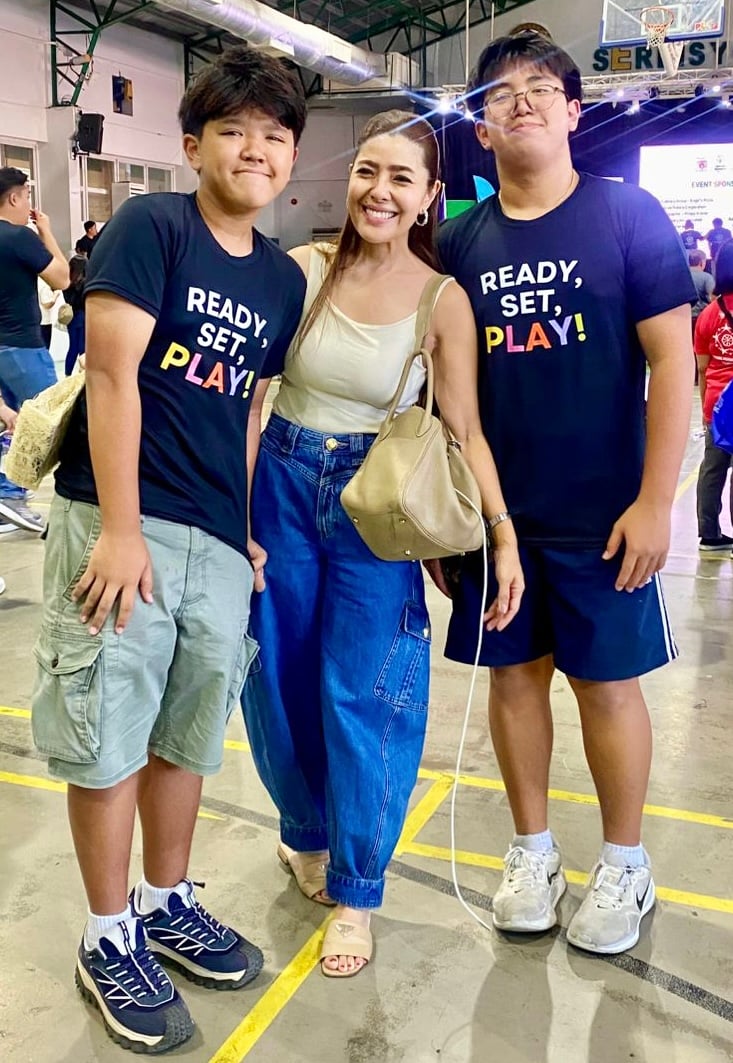 Happy Ongpauco-Tiu with her two boys.