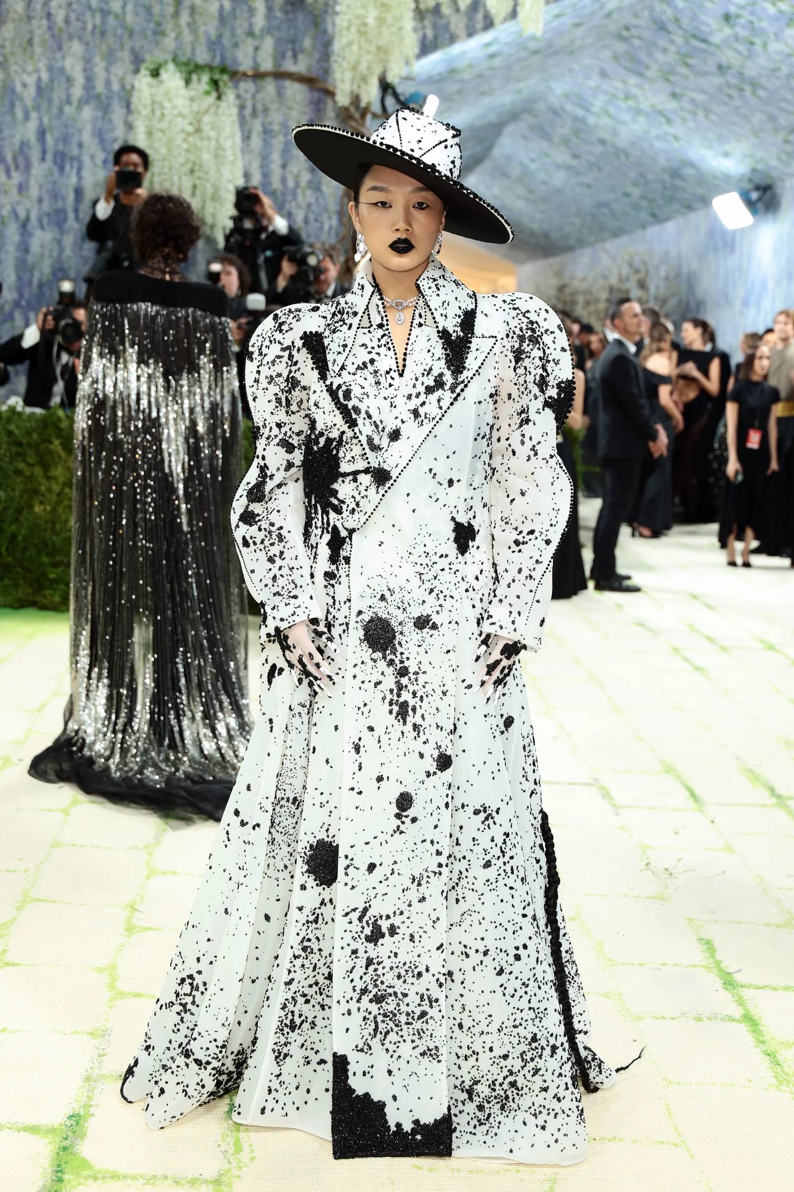 Could Audrey Nuna be channeling Jackson Pollock in this sculptural coat by Robert Wun