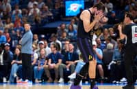 LUKA Doncic grimaces in pain after suffering a hamstring injury during the Los Angeles Lakers’ 96-139 loss to the Oklahoma City Thunder on 2 April.