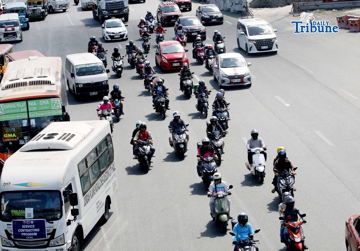 (May 08 2026) Motorcycle plying along Commonwealth Avenue in Quezon City on Friday May 8 2026. The Department of Social Welfare and Development has ordered transport network companies to submit all the names of drivers onboarded in their system. This is related to discrepancies in the list of TNVS drivers and motorcycle taxi riders who are beneficiaries of the fuel subsidy. DSWD Spokesperson Asec. Irene Dumlao assured that the list of drivers who will receive cash relief assistance from the department is clean. But the list of drivers who will be given assistance under the AICS will still come from the LTFRB. Photo/Analy Labor