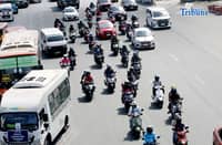 Motorcycle taxi riders passing the Commonwealth Avenue in Quezon City on Friday, 8 May 2026.