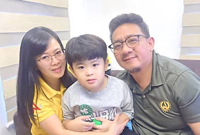 RAECHELL together with his only son Mikael and husband Michael.