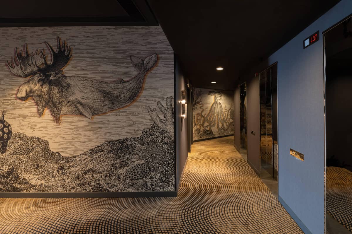 DESIGN details in the Hong Kong Suite frame layered views of the harbour, connecting bedroom and bath in one continuous visual flow.