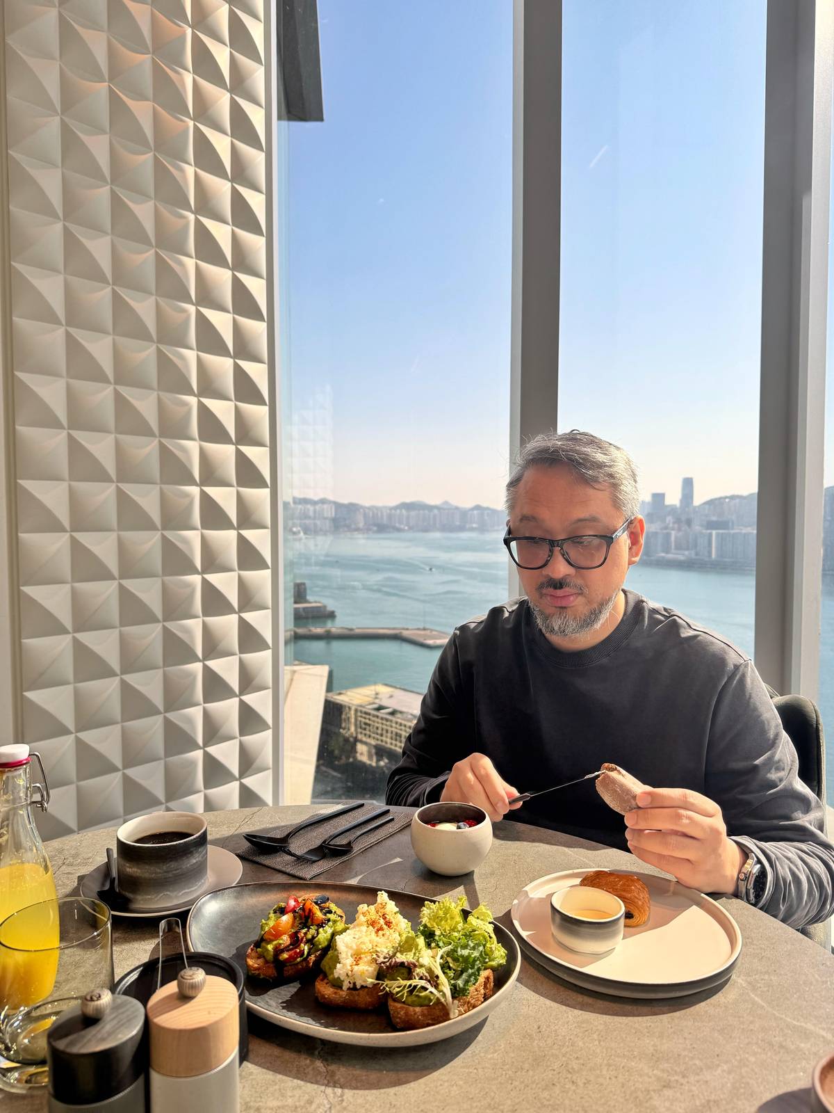 A MORNING that asks you to slow down — breakfast on the 38th floor, where the Victoria Harbour becomes part of the table.