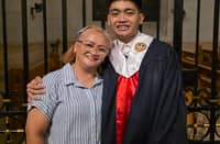 RHODA Orcullo (left) shares a moment with her writer-son, Jerod, during the latter’s graduation from Colegio de San Juan de Letran.