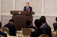 PANGA delivering speech in a business forum in Japan.