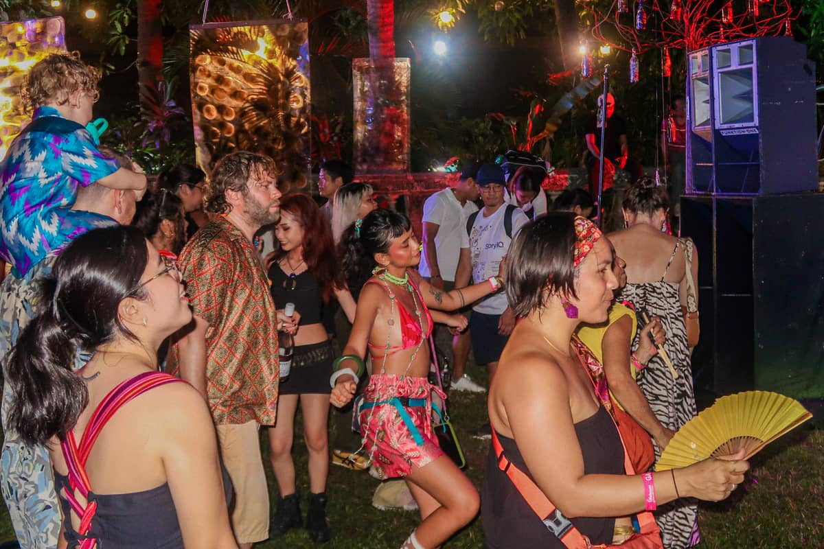 THE crowd gathers until sundown for music and arts.