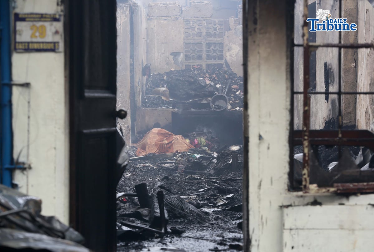 (May 14 2026) Firefighters responded the fourth-alarm fire that claimed the life of a 15-year-old boy at East Riverside, Barangay Paltok, Quezon City, on Thursday, May 14, 2026. Photo/Analy Labor