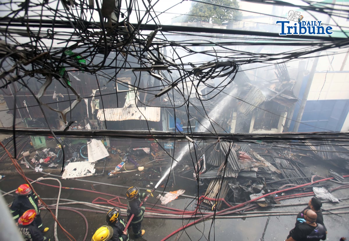 (May 14 2026) Firefighters responded the fourth-alarm fire that claimed the life of a 15-year-old boy at East Riverside, Barangay Paltok, Quezon City, on Thursday, May 14, 2026. Photo/Analy Labor