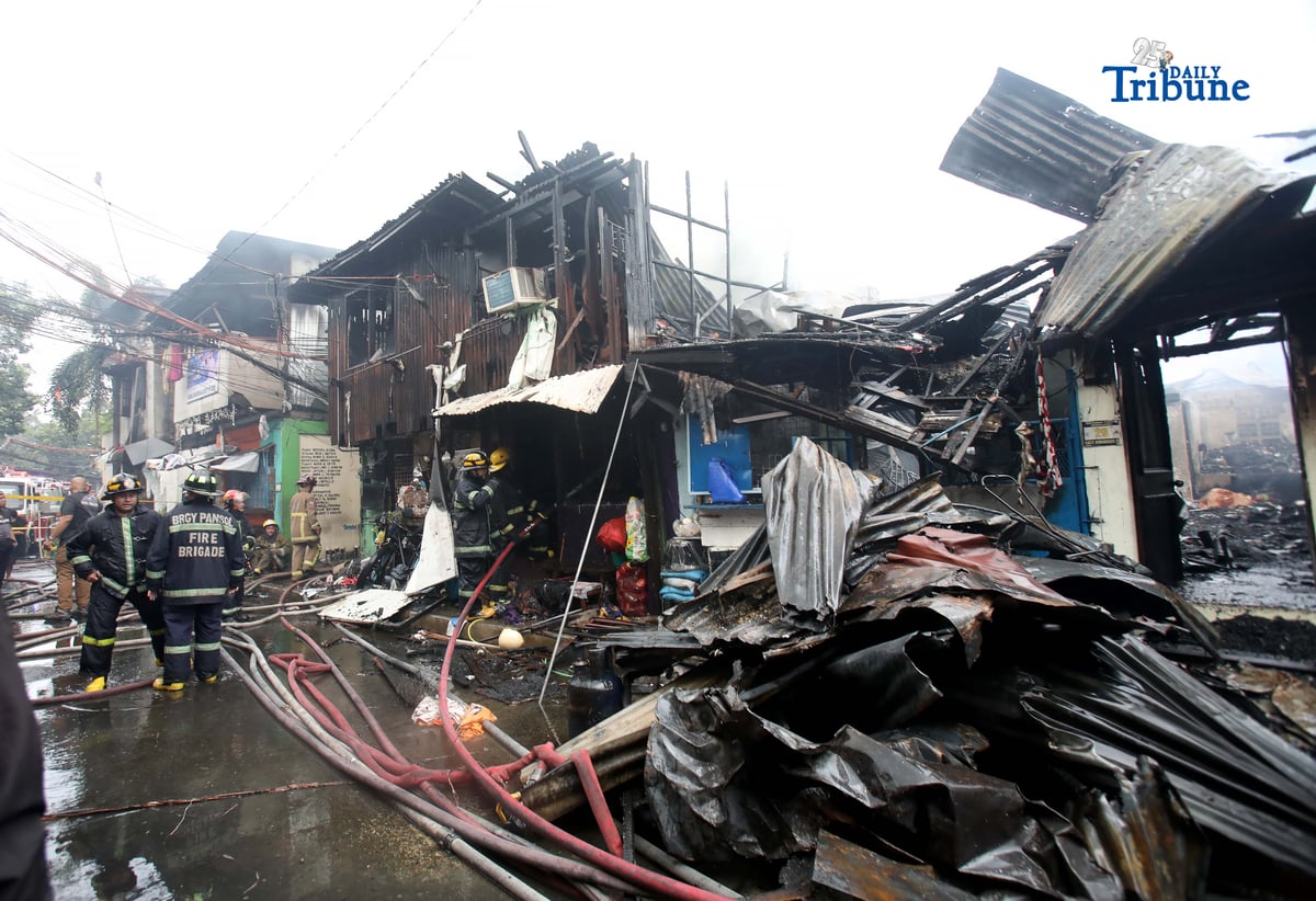 (May 14 2026) Firefighters responded the fourth-alarm fire that claimed the life of a 15-year-old boy at East Riverside, Barangay Paltok, Quezon City, on Thursday, May 14, 2026. Photo/Analy Labor