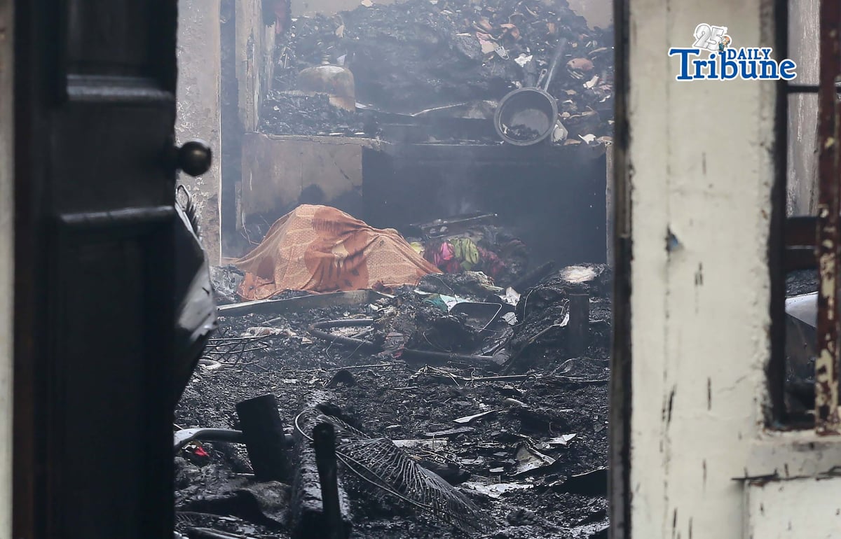 (May 14 2026) Firefighters responded the fourth-alarm fire that claimed the life of a 15-year-old boy at East Riverside, Barangay Paltok, Quezon City, on Thursday, May 14, 2026. Photo/Analy Labor