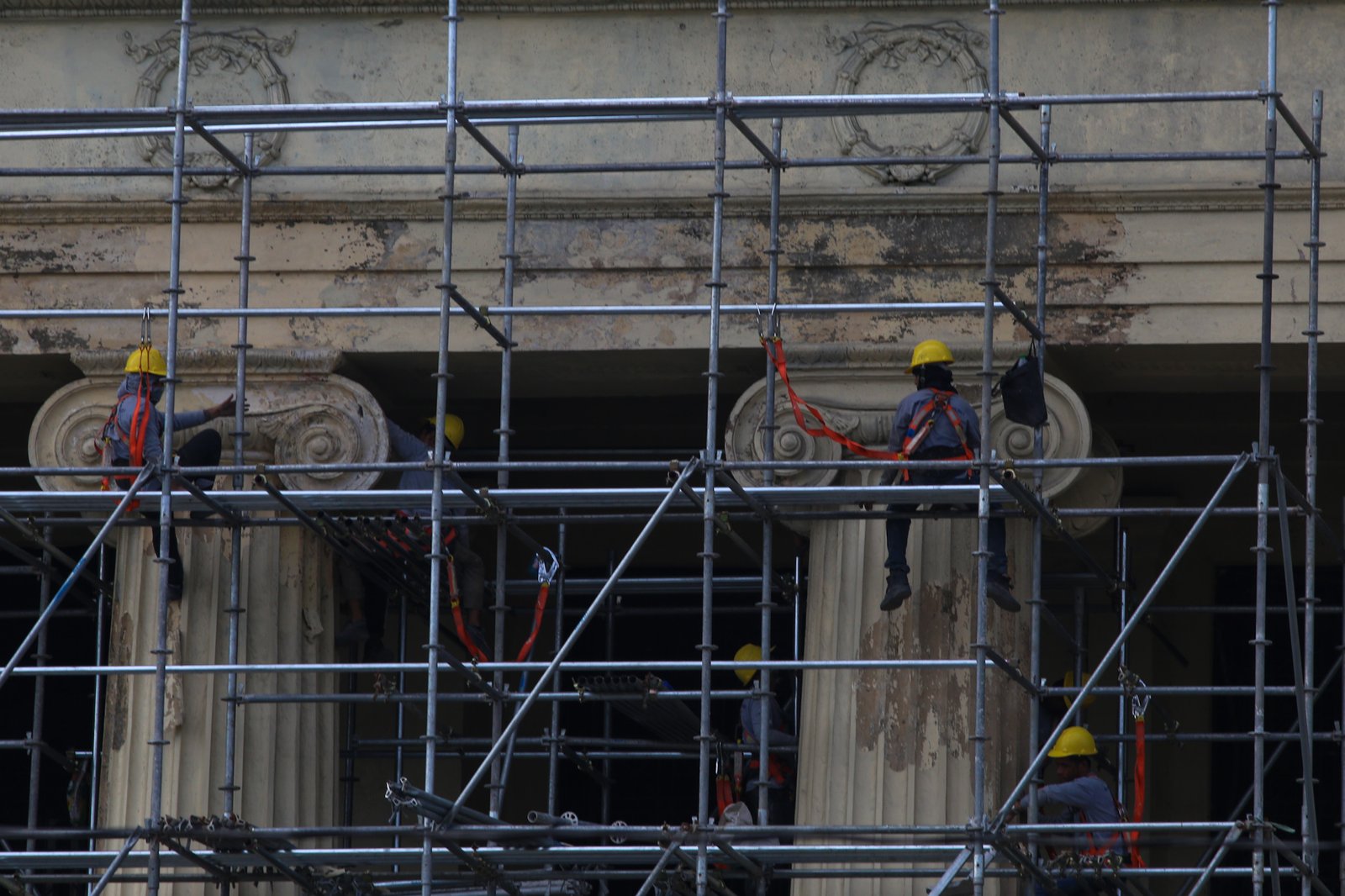 The Manila Central Post Office undergoes restoration in this photo taken on 15 May 2026. The neoclassical landmark was designed by Filipino architects Juan Arellano and Tomas Mapua, alongside American architect Ralph Harrington Doane, in 1926. The structure is being reborn after being gutted by a 30-hour fire on May 21, 2023.