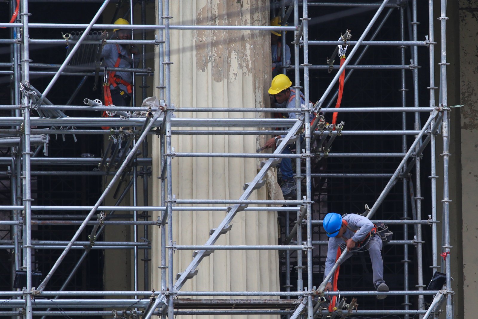 The Manila Central Post Office undergoes restoration in this photo taken on 15 May 2026. The neoclassical landmark was designed by Filipino architects Juan Arellano and Tomas Mapua, alongside American architect Ralph Harrington Doane, in 1926. The structure is being reborn after being gutted by a 30-hour fire on May 21, 2023.