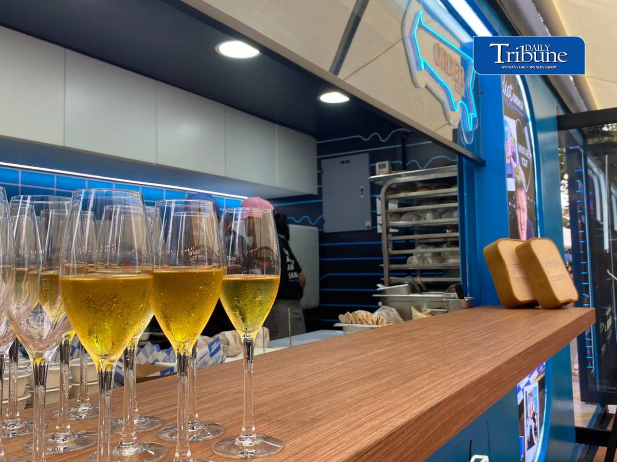 FOOD truck restaurant of the Gordon Ramsay Bar & Grill, with champagne served to guests
