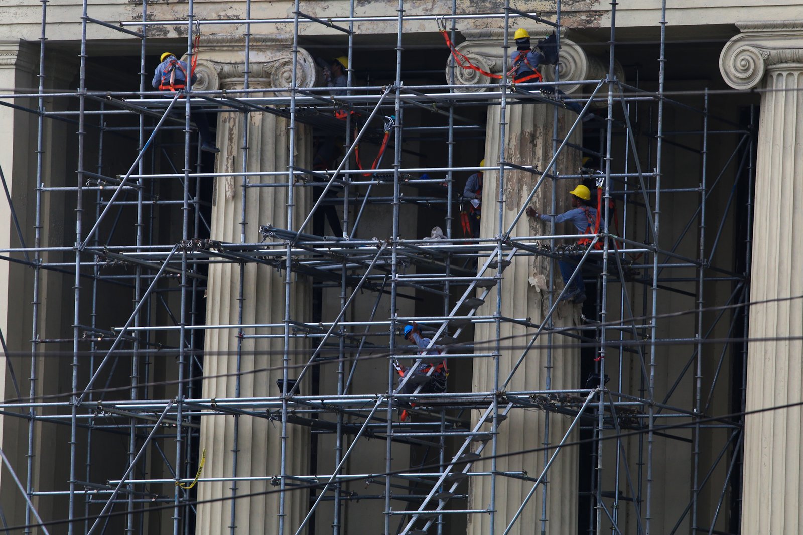 The Manila Central Post Office undergoes restoration in this photo taken on 15 May 2026. The neoclassical landmark was designed by Filipino architects Juan Arellano and Tomas Mapua, alongside American architect Ralph Harrington Doane, in 1926. The structure is being reborn after being gutted by a 30-hour fire on May 21, 2023.
