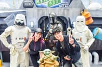 MALLGOERS pose with Star Wars characters and Grogu during the ‘Star Wars Most Wanted’ pop-up event at SM North EDSA ahead of the theatrical release of The Mandalorian and Grogu.