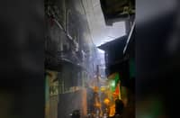 FIRE investigators inspect the damage after a deadly blaze hit New Barrio, Caloocan City, late Thursday night. Bureau of Fire Protection personnel arrived at the scene in Barangay 145 shortly after the fire broke out at 10 p.m., but reported one fatality — a 50-year-old bedridden woman.