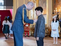 Filipino educator awarded MBE at Windsor Castle for school leadership
