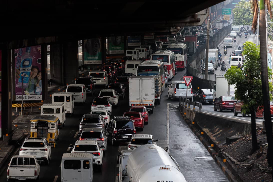 Motorists experience heavy traffic on the South Luzon Expressway southbound in Parañaque City on Saturday morning, following heavy rain that caused flooding in some parts of the expressway.