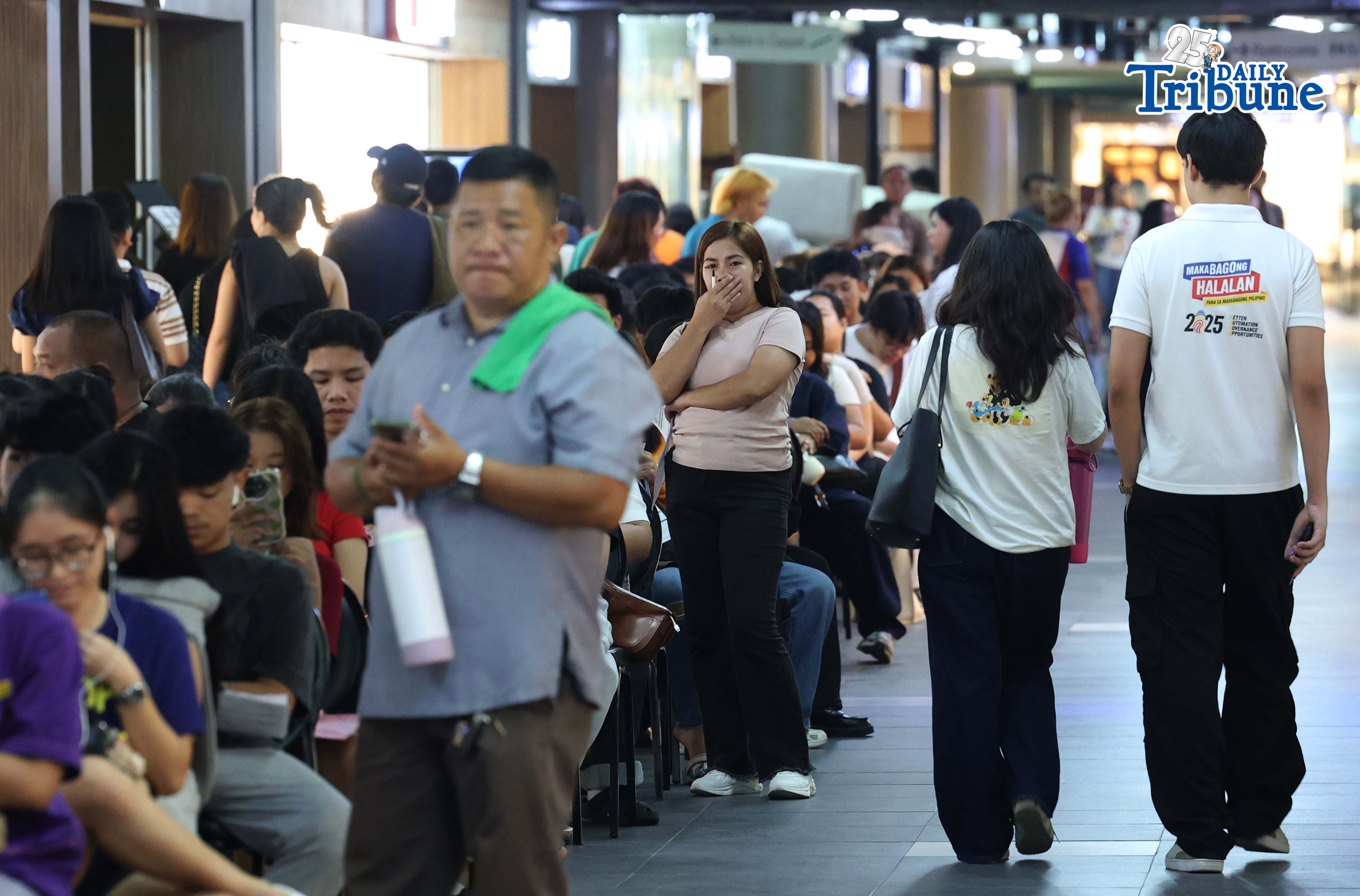 (May 18 2026) Future-voters wait in line as they try to beat the deadline of the last day for the voter's registration at the SM North EDSA in Quezon City on Monday, May 18, 2026. The Comelec said that there is no extension for the voter's registration for the Barangay and Sangguinang Kabataan elections. Photo/Analy Labor
