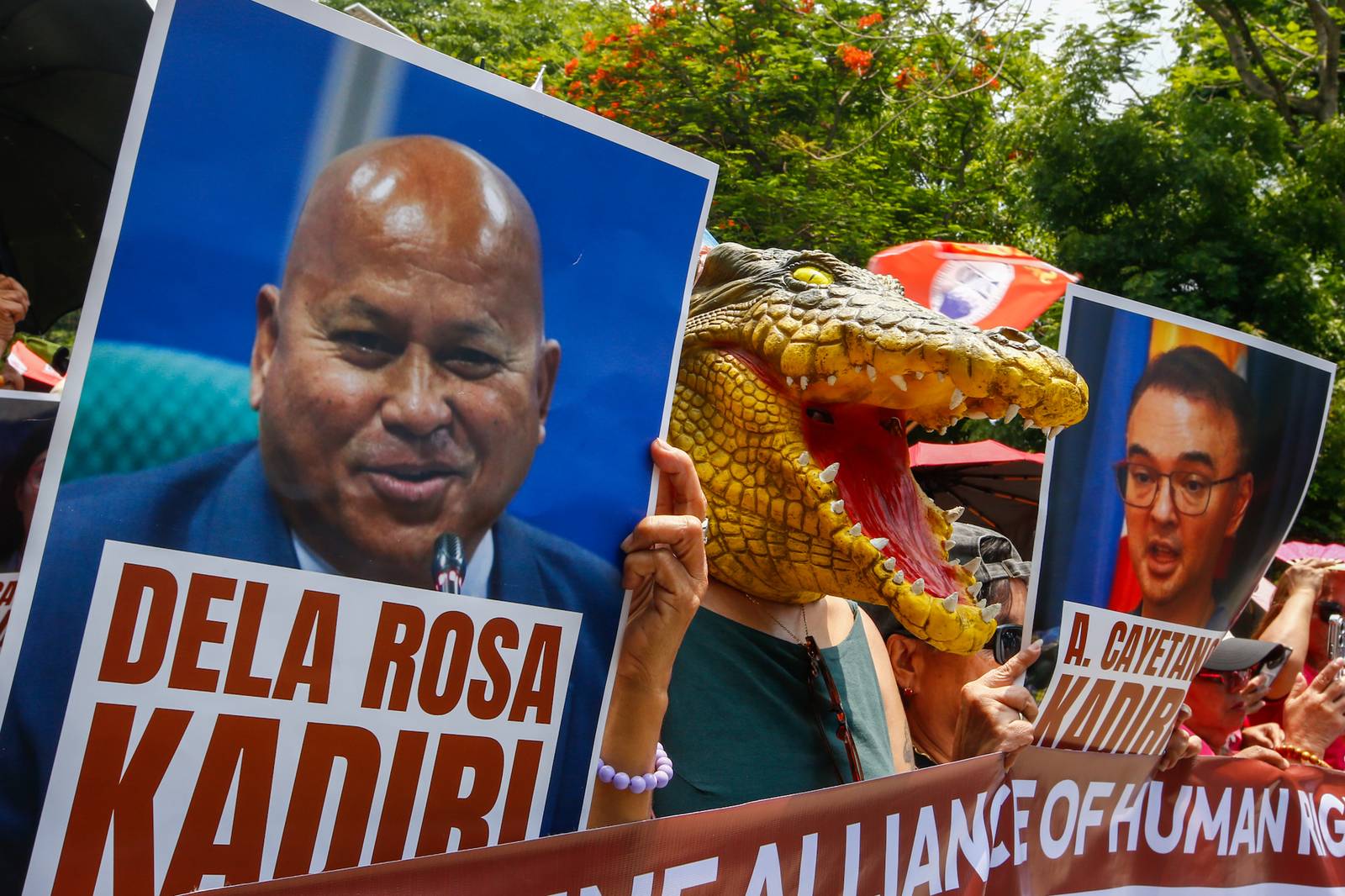 Human rights advocates march toward the Philippine Senate in Pasay City on 18 May 2026, as the chamber prepares to convene as an impeachment court against Vice President Sara Duterte. The protesters are demanding accountability for the escape of International Criminal Court fugitive Senator Ronald "Bato" Dela Rosa, who slipped away while under the Senate's protective custody.