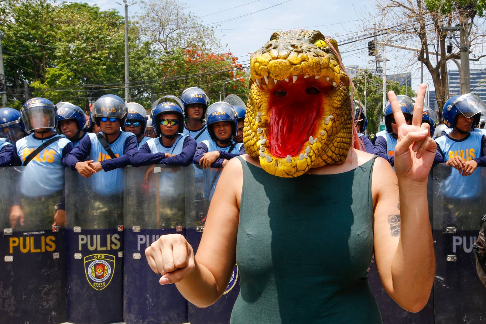 Human rights advocates march toward the Philippine Senate in Pasay City on 18 May 2026, as the chamber prepares to convene as an impeachment court against Vice President Sara Duterte. The protesters are demanding accountability for the escape of International Criminal Court fugitive Senator Ronald "Bato" Dela Rosa, who slipped away while under the Senate's protective custody.