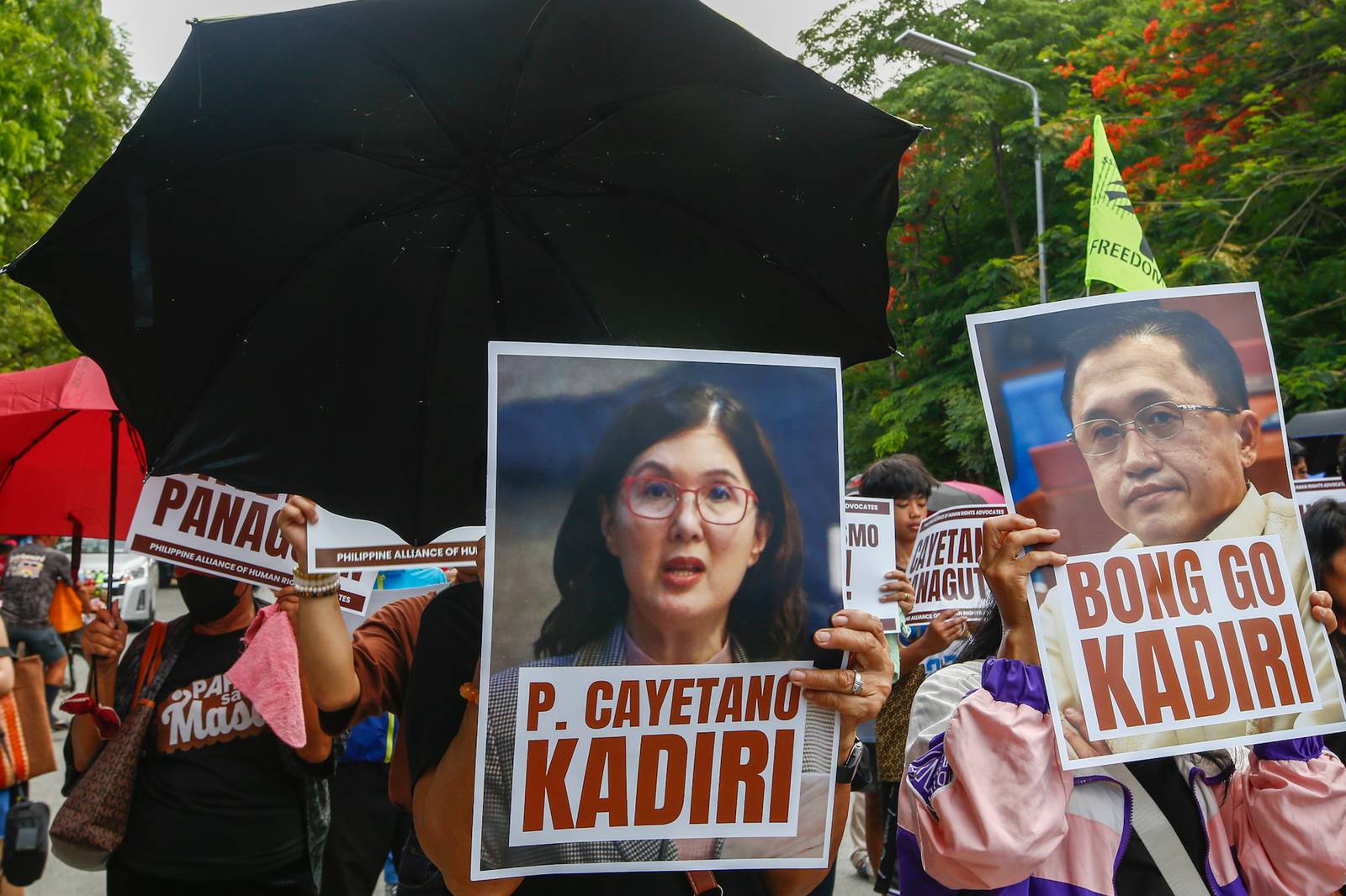 Human rights advocates march toward the Philippine Senate in Pasay City on 18 May 2026, as the chamber prepares to convene as an impeachment court against Vice President Sara Duterte. The protesters are demanding accountability for the escape of International Criminal Court fugitive Senator Ronald "Bato" Dela Rosa, who slipped away while under the Senate's protective custody.