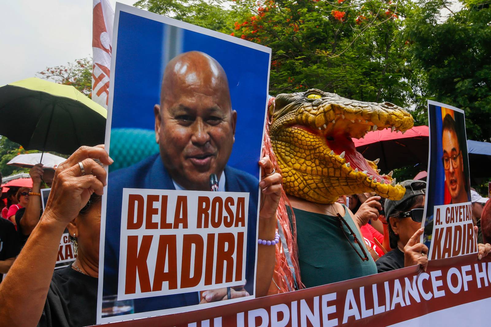 Human rights advocates march toward the Philippine Senate in Pasay City on 18 May 2026, as the chamber prepares to convene as an impeachment court against Vice President Sara Duterte. The protesters are demanding accountability for the escape of International Criminal Court fugitive Senator Ronald "Bato" Dela Rosa, who slipped away while under the Senate's protective custody.