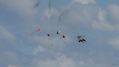 Aircraft collision at air show downs two fighter jets
