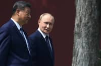CHINESE President Xi Jinping and Russian President Vladimir Putin walk at the personal residence of the Chinese leader Zhongnanhai in Beijing, China.