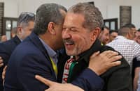 YASSER Abbas, newly-elected member of Fatah’s central committee, celebrates with a supporter in Ramallah in the occupied West Bank. The son of Palestinian president Mahmoud Abbas won a seat on Fatah’s top decision-making body, as initial results emerged from the Palestinian movement’s first congress in a decade.