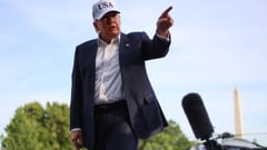 Trump holds off new Iran attack