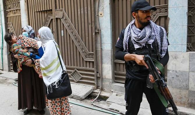 Gunmen kill officers guarding polio workers