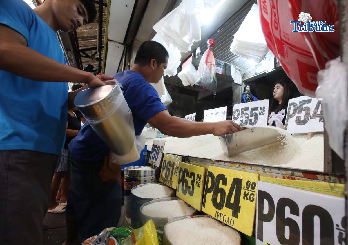 (May 20 2026) Rice vendors tend their customers buying rice at Marikina Public Market on Wednesday May 20 2026. The Department of Agriculture (DA) has assured rice retailers and traders that the government’s P50 per kilo price ceiling on 5 percent broken imported rice remains fair and still allows decent margins across the supply chain, even as it enforces the directive of President Ferdinand Marcos Jr. Photo/Analy Labor